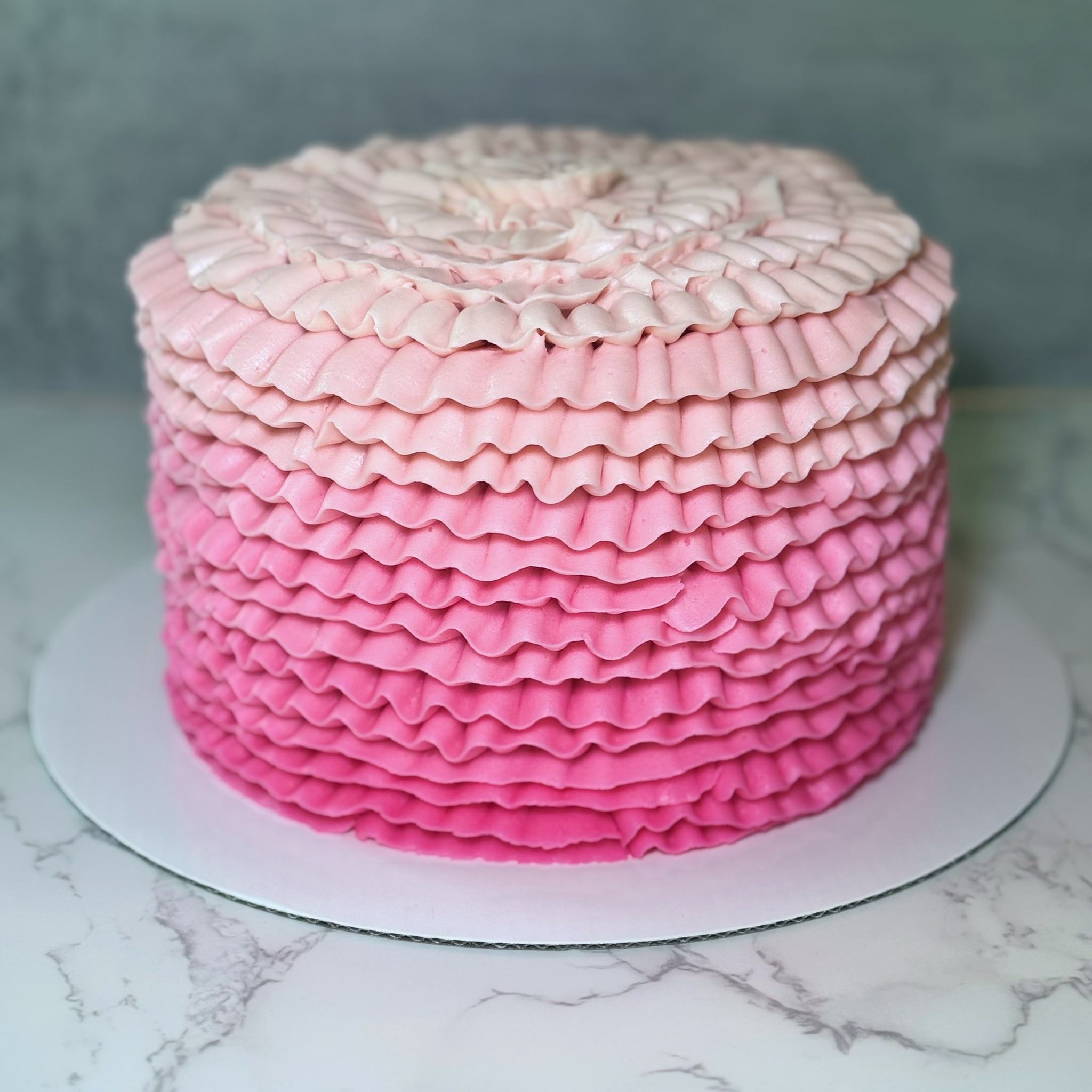 Pink ruffle ombre cake